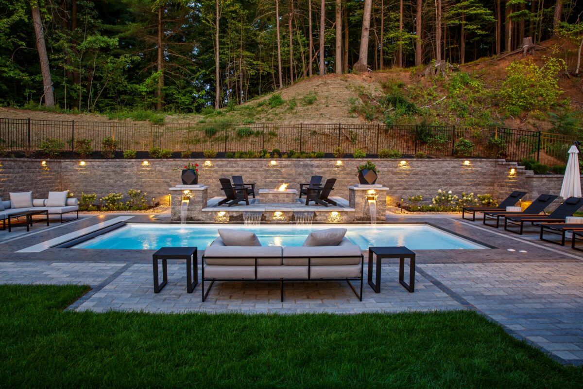 Backyard patio with pool and firepit